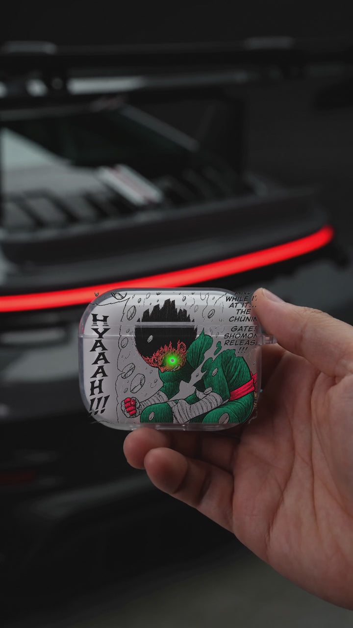 Eight Gates AirPods case opening in hand with Porsche background