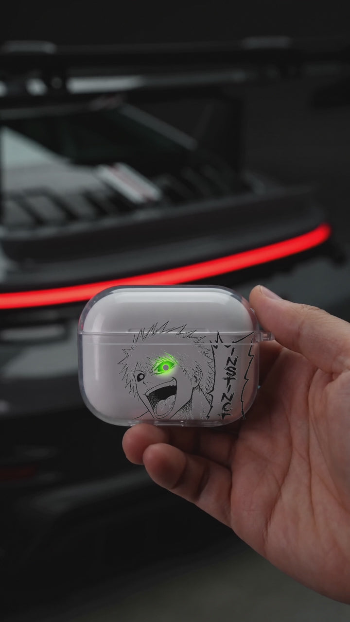Ichigo Laugh AirPods case opening in hand with Porsche background