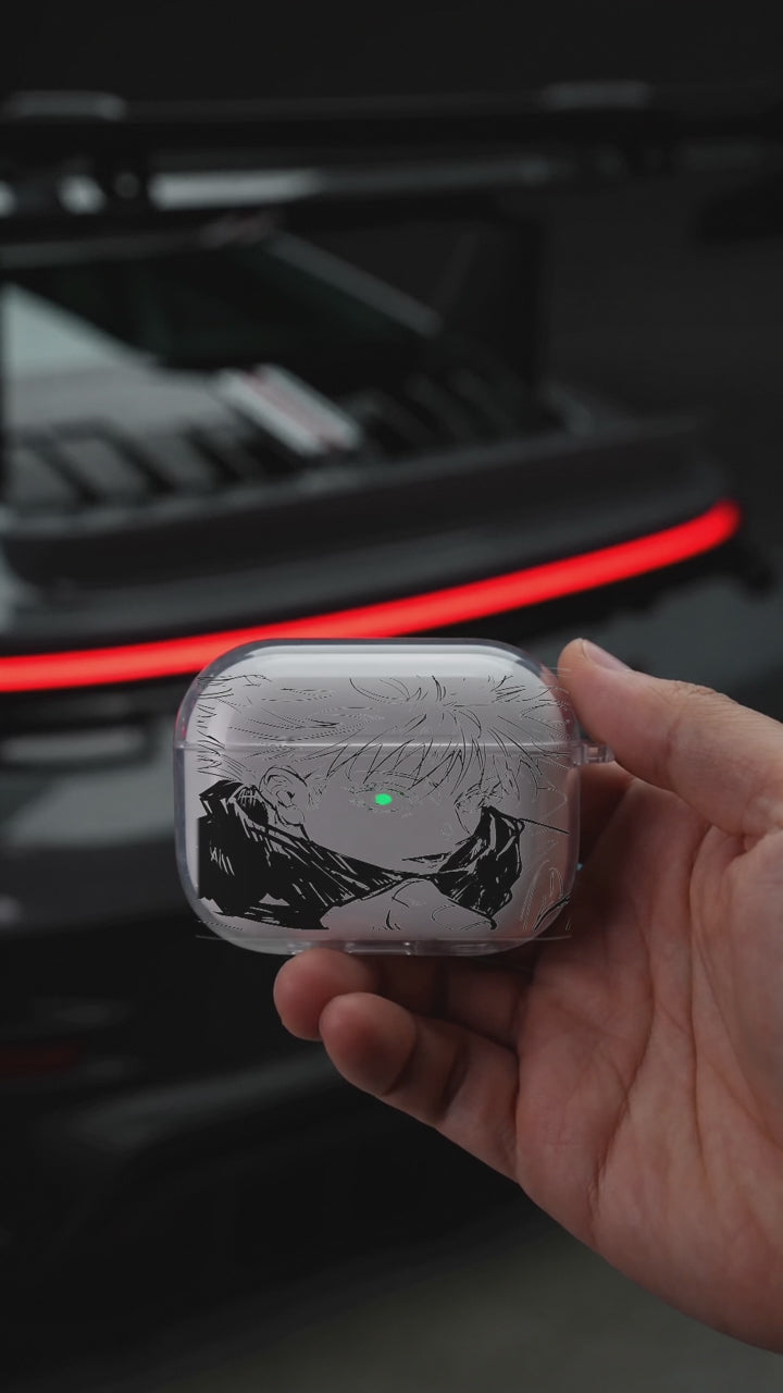 Gojo Manga Portrait AirPods case opening in hand with Porsche background