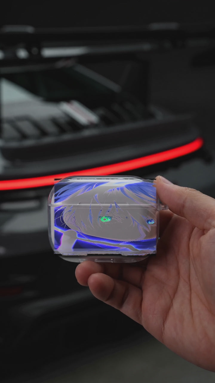 Gojo Blue Portrait AirPods case opening in hand with Porsche background
